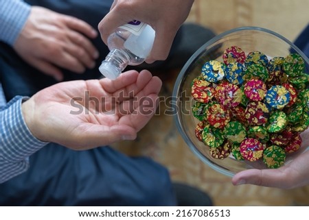Turkish islamic festivals culture background photo. Iyi bayramlar or eid mubarak. Pouring cologne and serving chocolates to the guests or visitors in eid al adha or fitr in Turkey.