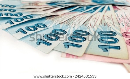 Turkish lira fan on a white background. Turkish money. 100 and 200 tl notes. Banner for website, desktop wallpaper, copy space for text and advertising, blank, empty, white, clear space