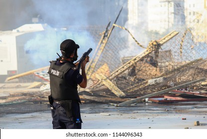 Turkish Riot Police Using Tear Gas Gun, Aiming At Protesters