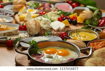 Similar – Image, Stock Photo Fried egg with a bell pepper and tomatoes