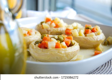 Turkish Style Cooked Artichoke With Peas, Potatoes And Carrots On Top