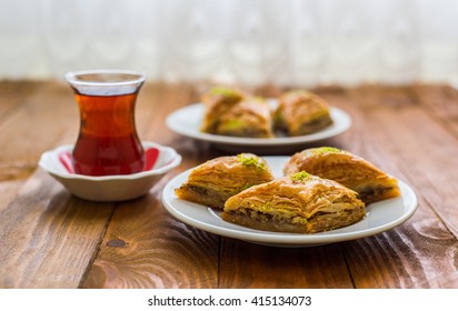 Turkish Sweet Baklava On Plate With Turkish Tea.