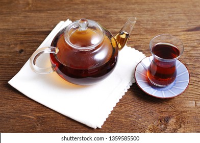 Turkish Tea In A Glass And A Pot, Wooden Table