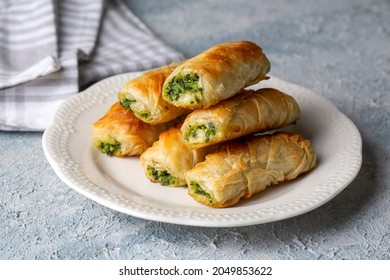 Turkish Tepsi Boregi, Round Borek, Tray pastry (Turkish name; rulo borek - sigara boregi) - Shutterstock ID 2049853622