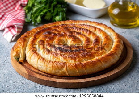 Turkish Tepsi Boregi, Round Borek, Tray pastry (Turkish name; rulo borek) Stock fotó © 