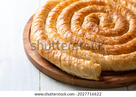 Turkish Tepsi Boregi, Round Borek, Tray pastry (Turkish name; rulo borek) Stock fotó © 