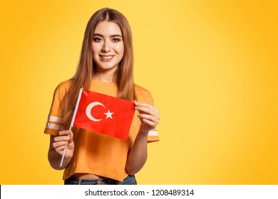 Turkish Young Woman Celebrating While Holding The Flag Of Turkey In Slow Motion