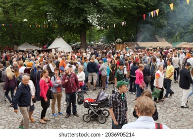 TURKU, ABO FINLAND ON JUNE 29. View of spectator, viewer, audience in a square on June 29, 2013 in Turku, Abo Finland. Unidentified people in the Medieval Festival. Stand along the walls. 