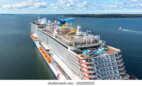 Turku, Finland - Sep 05 2022: Carnival Cruise Line New Cruise Ship CARNIVAL CELEBRATION Making Way Ahead On Her Way For Sea Trials Through Finnish Archipelago. Aerial Stern View On Top Deck