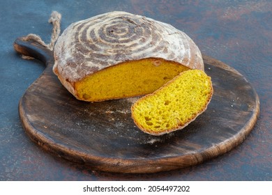 Turmeric (Curcumin) Sourdough bread With  Hazelnut Over Rustic Wood Cutting Board - Shutterstock ID 2054497202