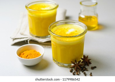 Turmeric Latte, Golden Milk, Tea, Healthy Vegan Drink with Cinnamon and Spices