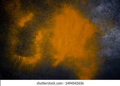 Turmeric On A Black Surface