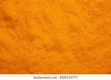 Turmeric powder background. Macro. Top view - Powered by Shutterstock