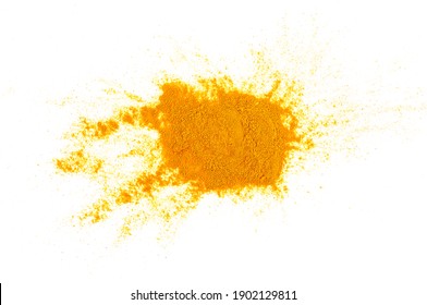 Turmeric powder pile isolated on a white background, top view. Curcuma powder.