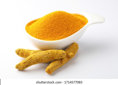 Turmeric powder and  roots turmeric - Powered by Shutterstock