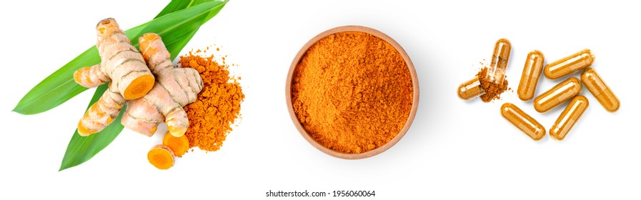 Turmeric root with green leaf, curcuma powder in wooden bowl and tumeric capsule isolated on white background. Natural medicine plant ,alternative medical health care and supplement concept . Top view