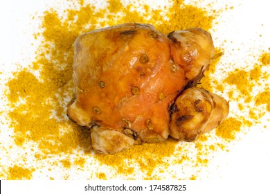 Turmeric Root And Powder Isolated On White.