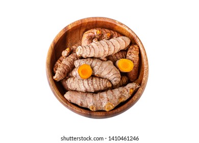 Turmeric Roots In Wooden Bowl Isolated On White. Top View Overhead Shot