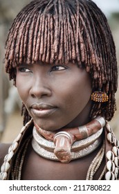 TURMI, ETHIOPIA - 12 AUGUST: portrait of unidentified Hamer tribe woman, Omo valley, 12 august 2014. Hamer woman usually comb their hairs with soil