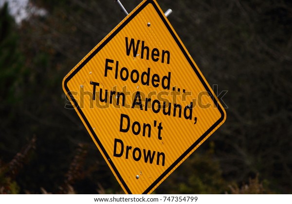 TURN AROUND DON\'T DROWN\
SIGN
