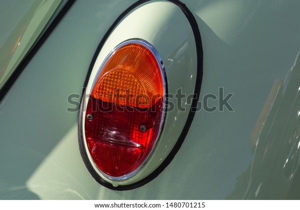 turn\
indicator of german car on a summer sunny\
afternoon