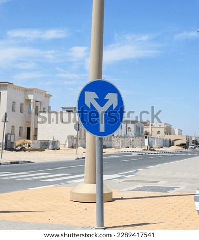 Turn left and right,road sign,traffic sign in blue and white colour