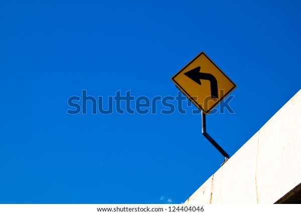 Turn left sign with blue\
sky2