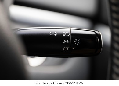 Turn signal lever, adjusting car headlight control switch. - Shutterstock ID 2195118045