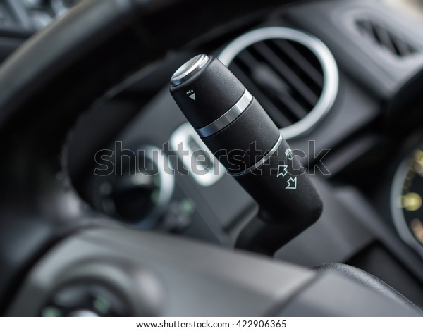 Turn signal\
switch in car, shallow depth of\
field