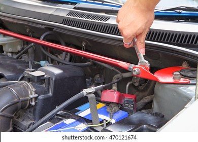 Turn The Wrench For Replacing Front Strut Bar