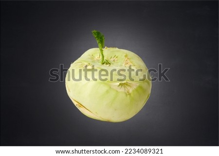 Turnip cabbage on the dark background.