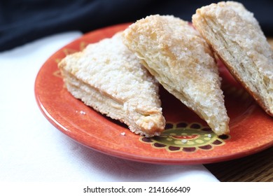 Turnovers Apple, Apple Pie, Served in an Orange Plate, Turnovers Apple is a popular dish in America.
