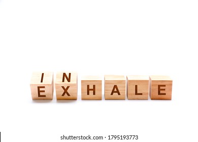 Turns Dice And Changes The Word INHALE To EXHALE. Inhale,Exhale Concept