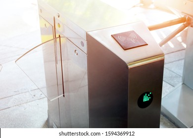 Turnstiles. Checkpoint. Automatic access control. Access system in front of the building. Automatic electronic entrance. Entrance gate with turnstile.