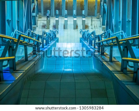 Turnstiles. Checkpoint. Automatic access control. Access system in the building. Automatic turnstile with sliding doors to control the flow of people. Entrance hall with turnstile