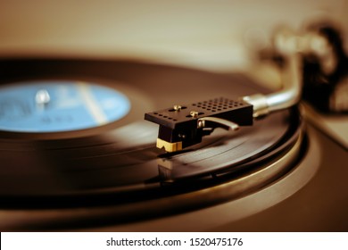 Turntable close up with vinyl playing