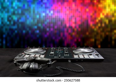 turntable and headphone for disc jockey to play music in nightclub at party 