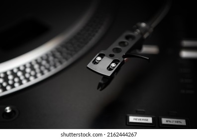 Turntables Needle Cartridge In Closeup. Professional DJ Turn Table Player For Vinyl Records. Curated Collection Of Royalty Free Music Photos And Images For Wallpaper Design On Shutter Stock