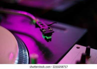 Turntables Needle Cartridge On Vinyl Player Tone Arm. Professional Dj Turntable On Concert Stage.