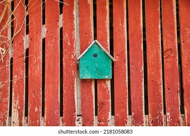 Turquoise Birdhouse On Faded Red Barnwood Side