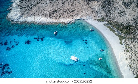 The turquoise blue beach on the uninhabited Polyaigos island in the Greek Cyclades - Shutterstock ID 2005163252