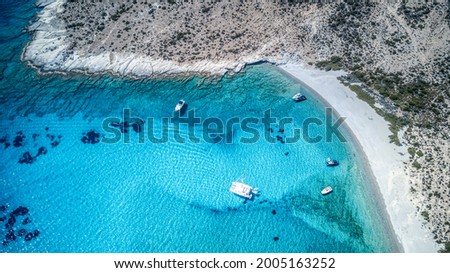 The turquoise blue beach on the uninhabited Polyaigos island in the Greek Cyclades