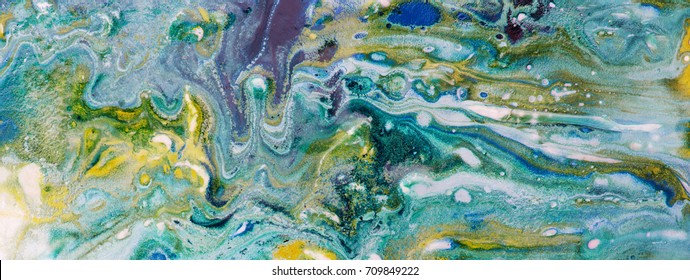 Turquoise blue and gold ochre free flow or pour style painting background. Complex and fine atmospheric patterns. wide header format.