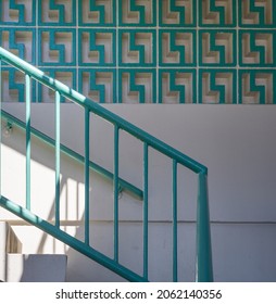 Turquoise Blue Railing And Bricks On White Stairs.  Template Background With A Theme Of Upward Movement.