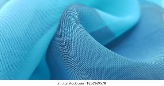 Turquoise blue, semi-transparent fabric in folds (texture).
 - Shutterstock ID 1856369578