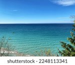 Turquoise blue waters of Lake Michigan from a bluff on the Leland Peninsula in Michigan.