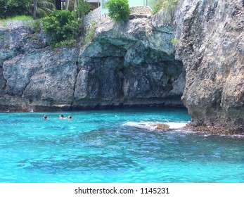 TURQUOISE COAST. Cave on Negril coast, Jamaica. No color enhancement, the sea was that color.