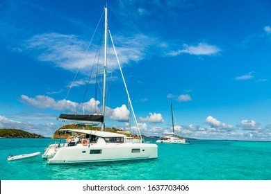 Turquoise colored sea with ancored catamarans, Tobago Cays, Saint Vincent and the Grenadines, Caribbean sea