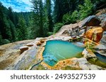 Turquoise Hot Spring in Lush Forest with Waterfall and Ripples Perspective