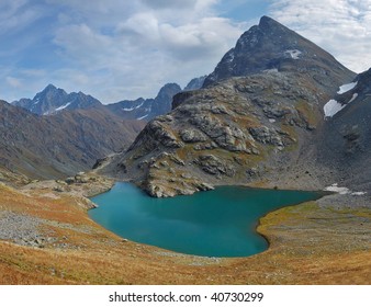 Turquoise lake at the feet of a mountain - Shutterstock ID 40730299